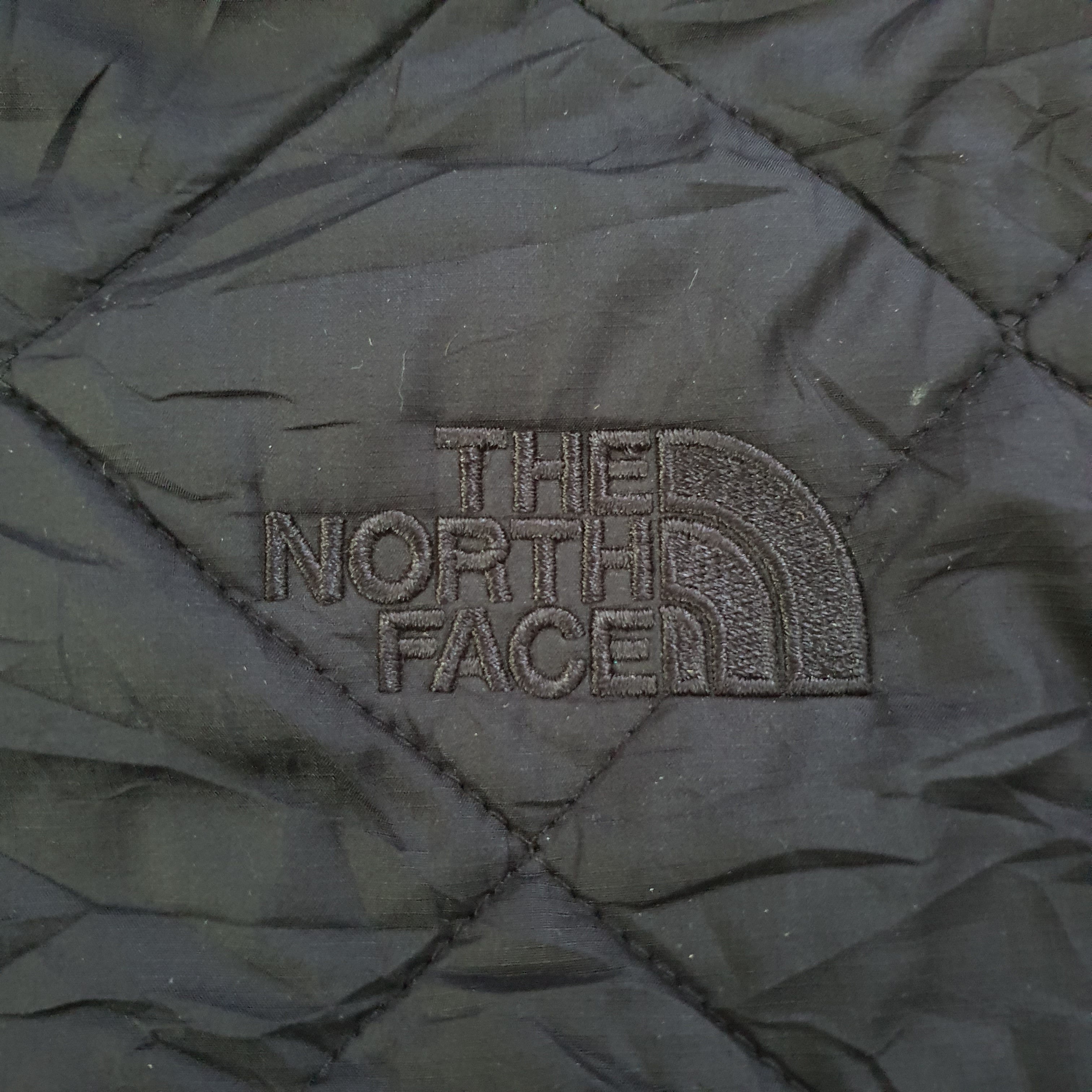 [M] The North Face quilted jacket